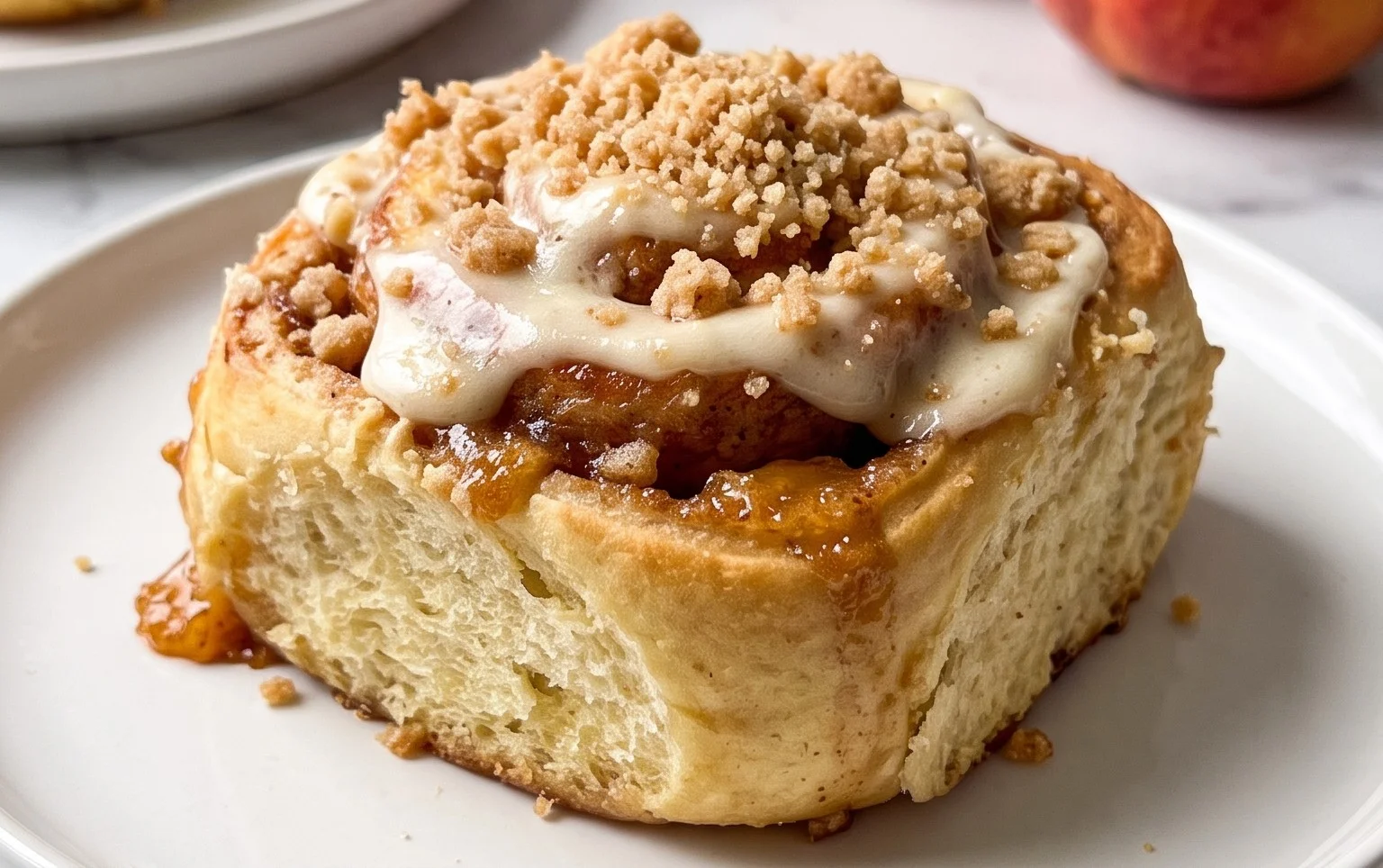 Peach Cobbler Cinnamon Rolls with Crum extractb Topping